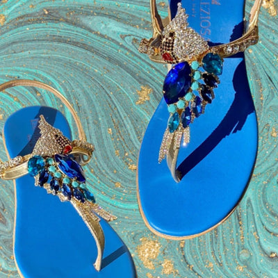 Our blue “Bellagio” sandals are...